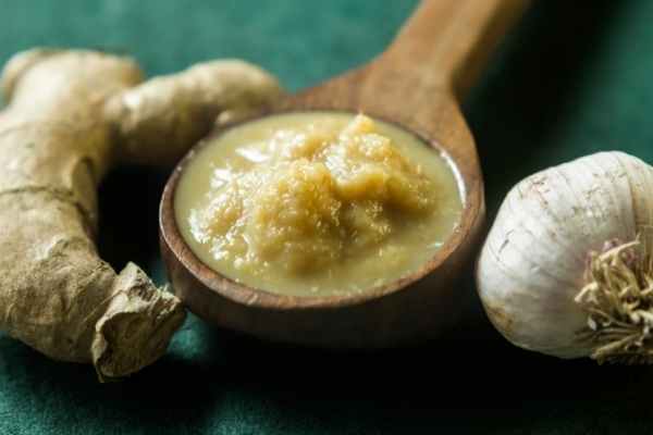 ginger garlic paste in a spoon